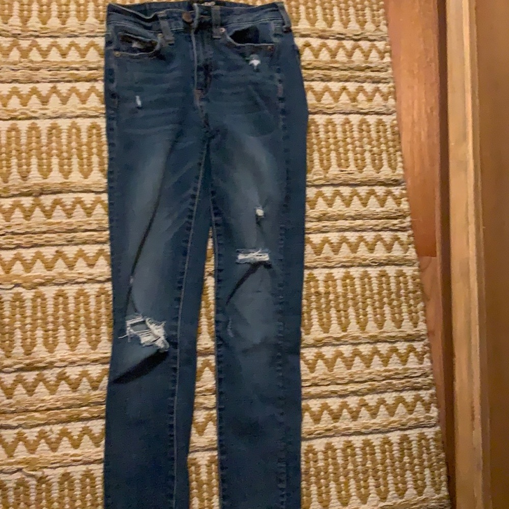 blue ripped jeans